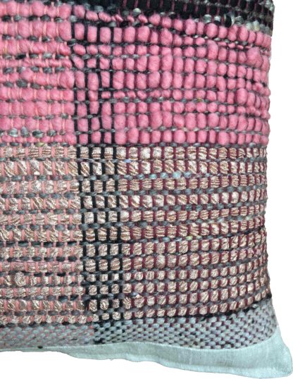 Detail of pink and shimmer striped cushion